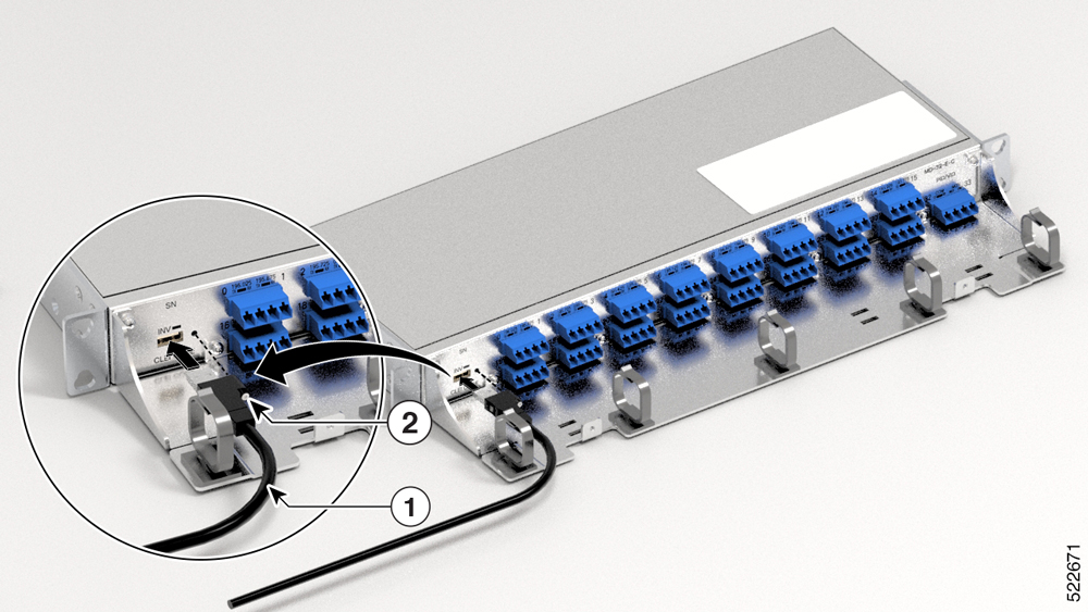 USB cable is aligned to connect to the INV port on the patch panel using a captive screw.